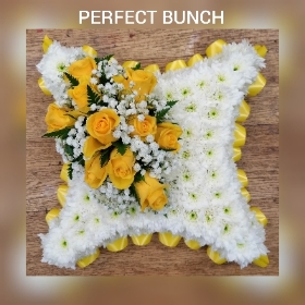Yellow and white cushion